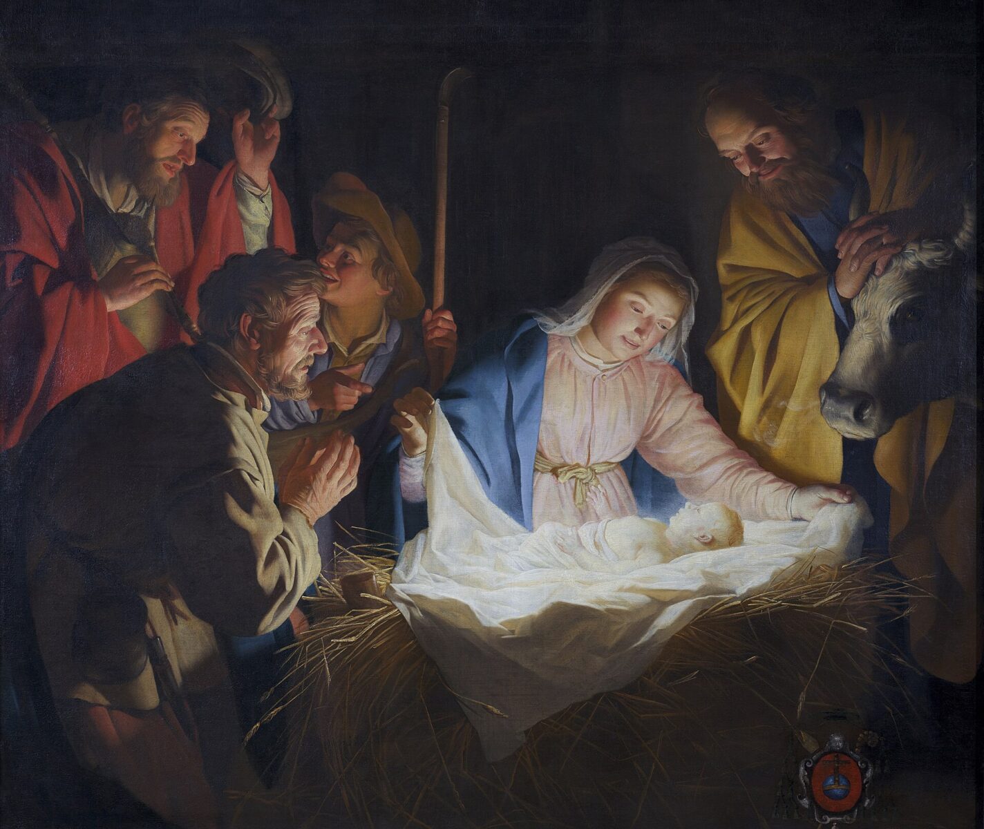 Gerard van Honthorst’s painting of shepherds gathered around the newborn Christ, his body lighting their faces in the dark