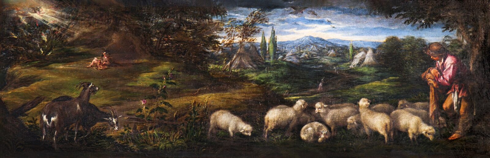 Moses kneels before a burning bush in a wide pastoral landscape with shepherds and flocks.