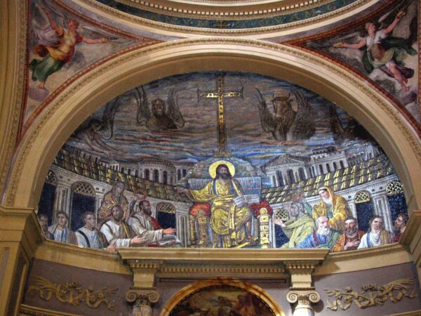 An early Christian mosaic of Christ enthroned at the center with the apostles seated around him.