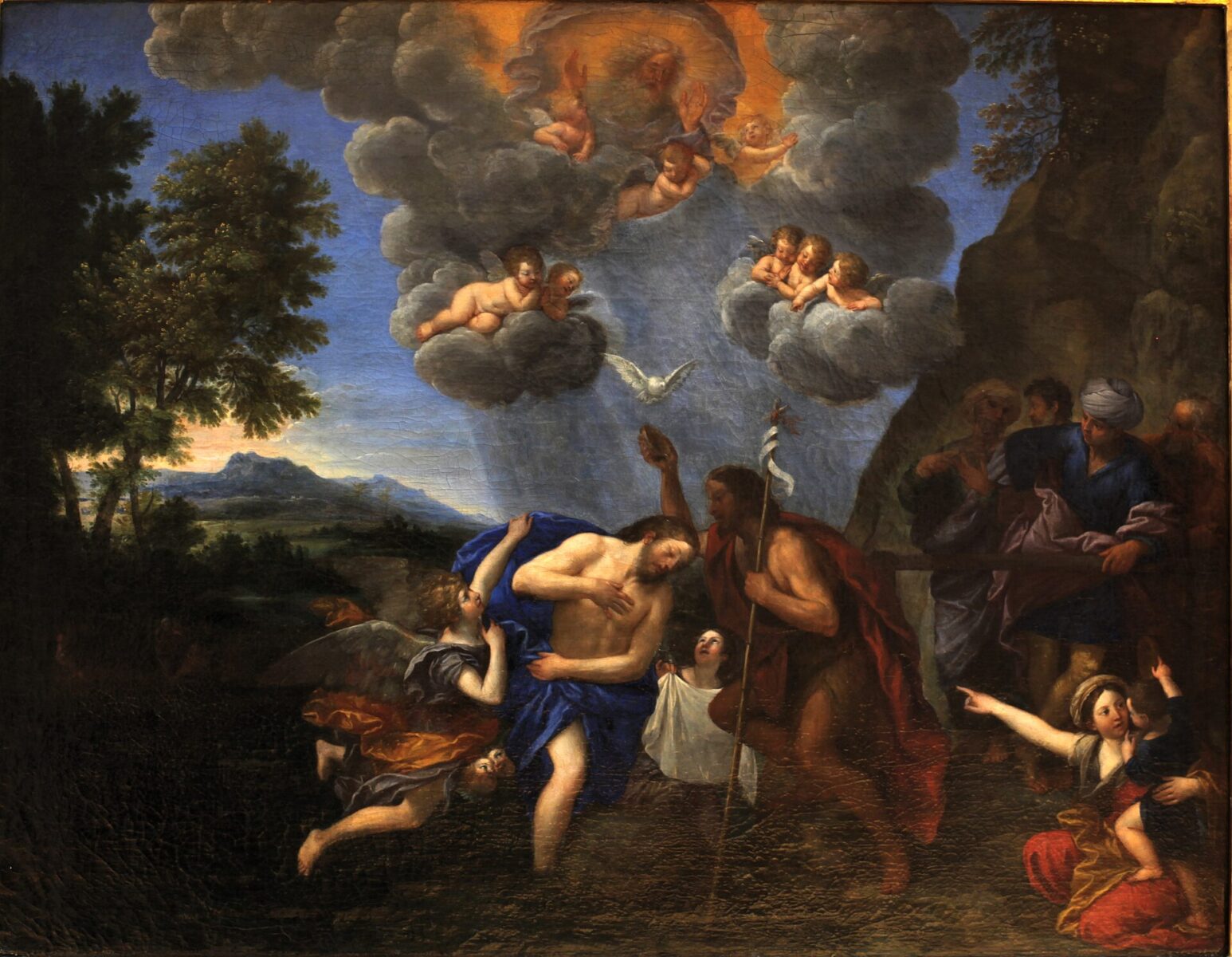 John baptises Christ in the Jordan as the Father and the dove of the Spirit appear in the opened heavens.