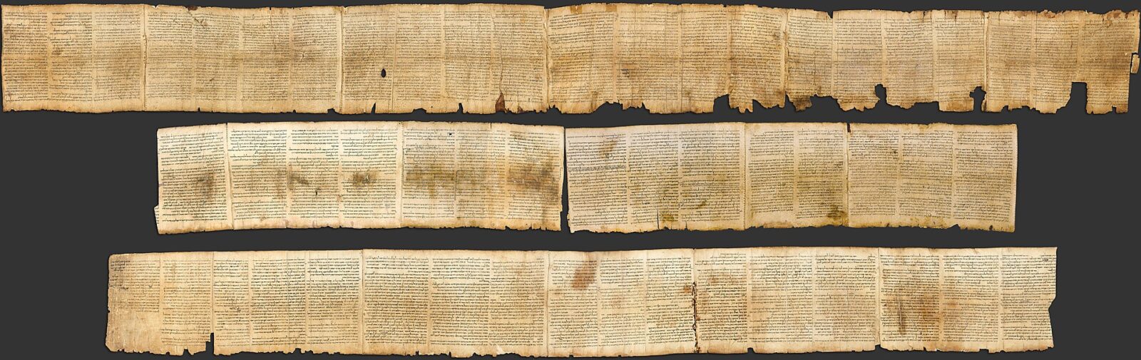 The Great Isaiah Scroll from Qumran, a long leather scroll covered in columns of Hebrew text
