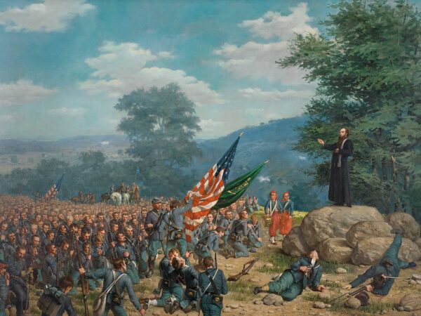 A priest stands on a rock with his hand raised in blessing over kneeling Union soldiers as smoke rises from the battlefield.